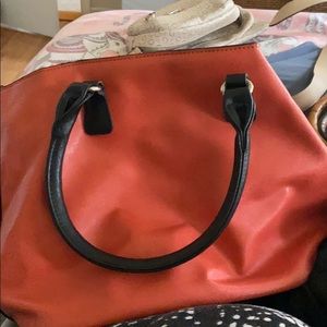 Clothes and purses and a blanket